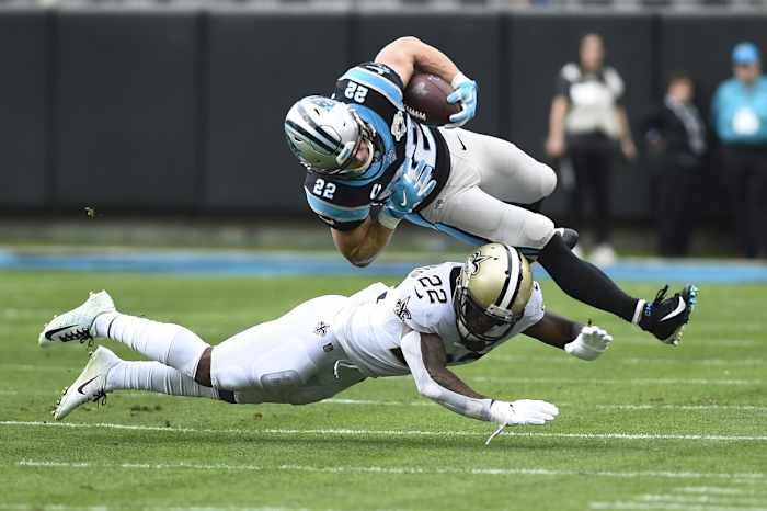 Carolina running back Christian McCaffrey (22) is tackled by Saints defensive back Chauncey Gardner-Johnson (22). Mandatory Credit: Bob Donnan-USA TODAY Sports